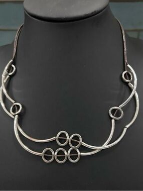 Lizzy James Handmade
Statement Necklace 20"
Silver-tone & Leather Cord Signed